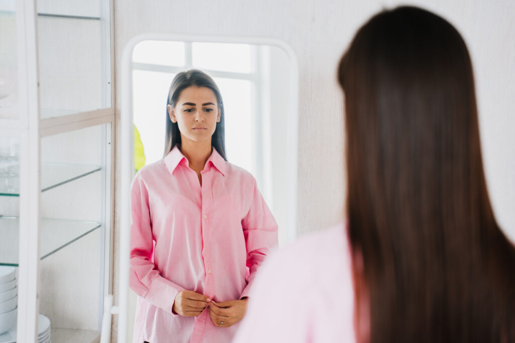 sad brunette fit young woman in pink oversize shir 2023 11 27 05 10 28 utc scaled